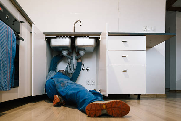Professional Plumbing technician working in Fairfax, IA